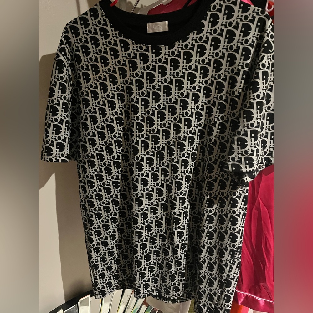Dior shirt very rich material size L fits close to body.